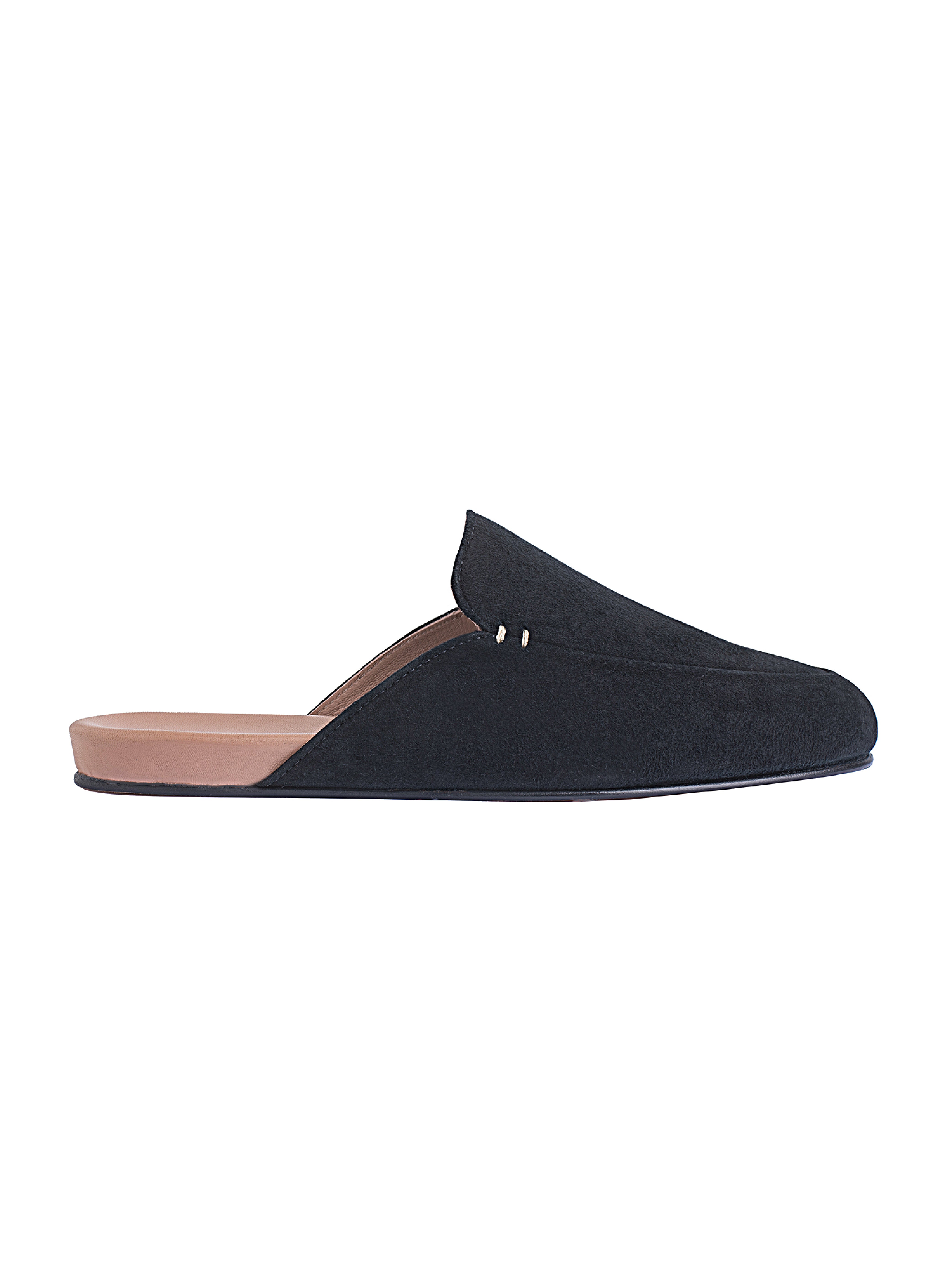 Women's black suede slip-on loafer with a pink insole on a white background