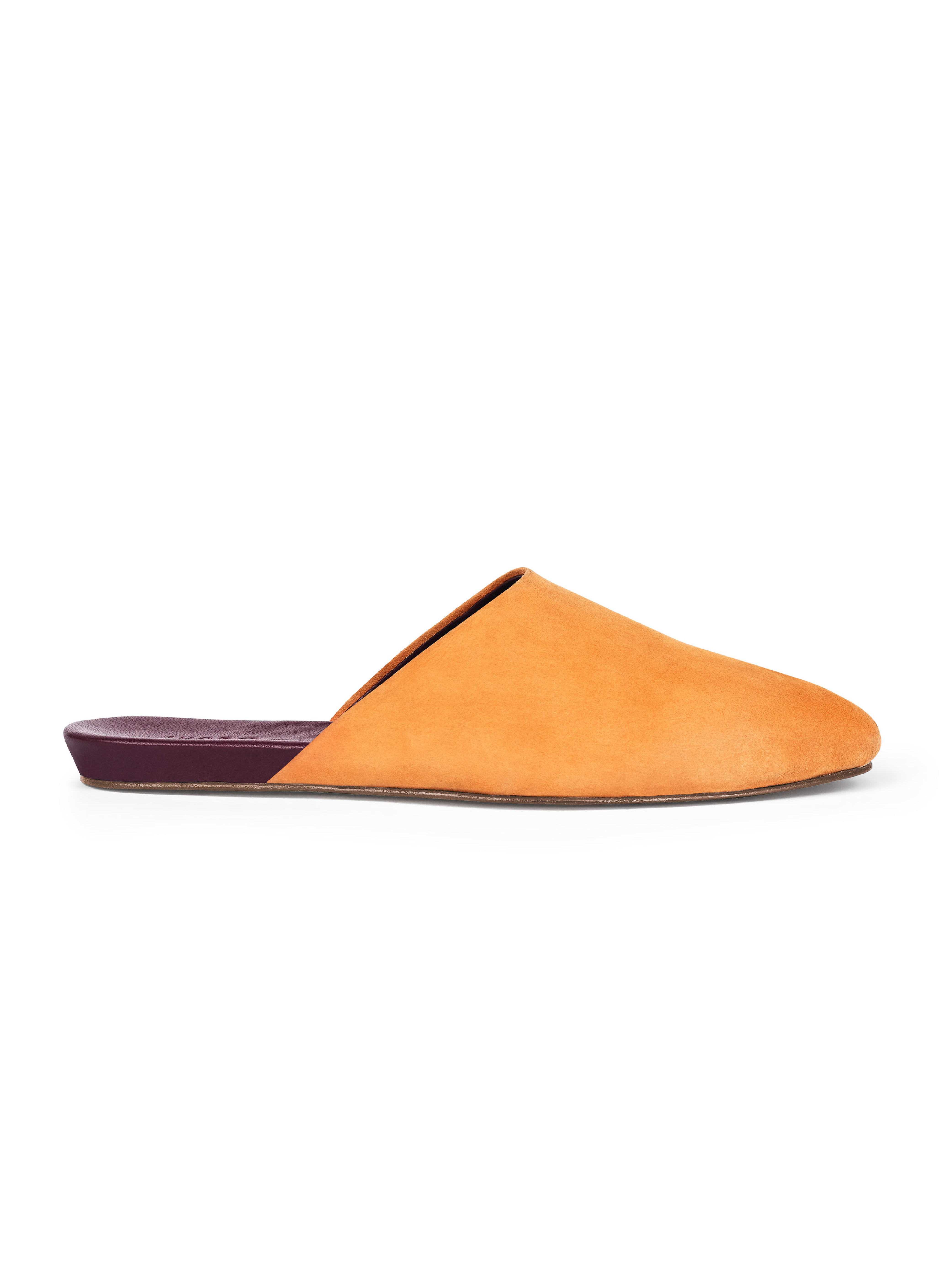 Women's yellow suede slipper with a burgundy sole on a white background