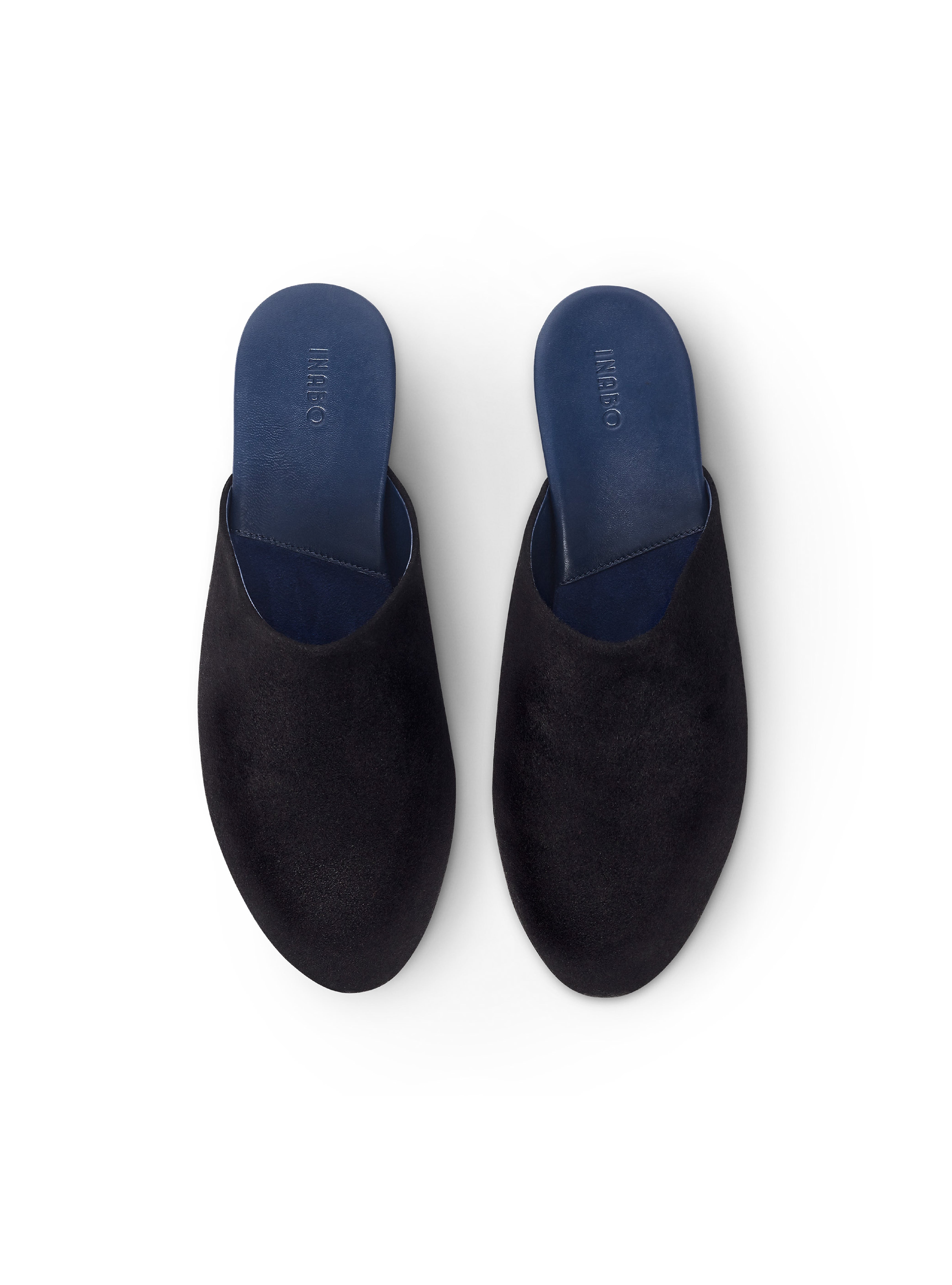 Men's pair of black suede slippers with blue interior on a white background
