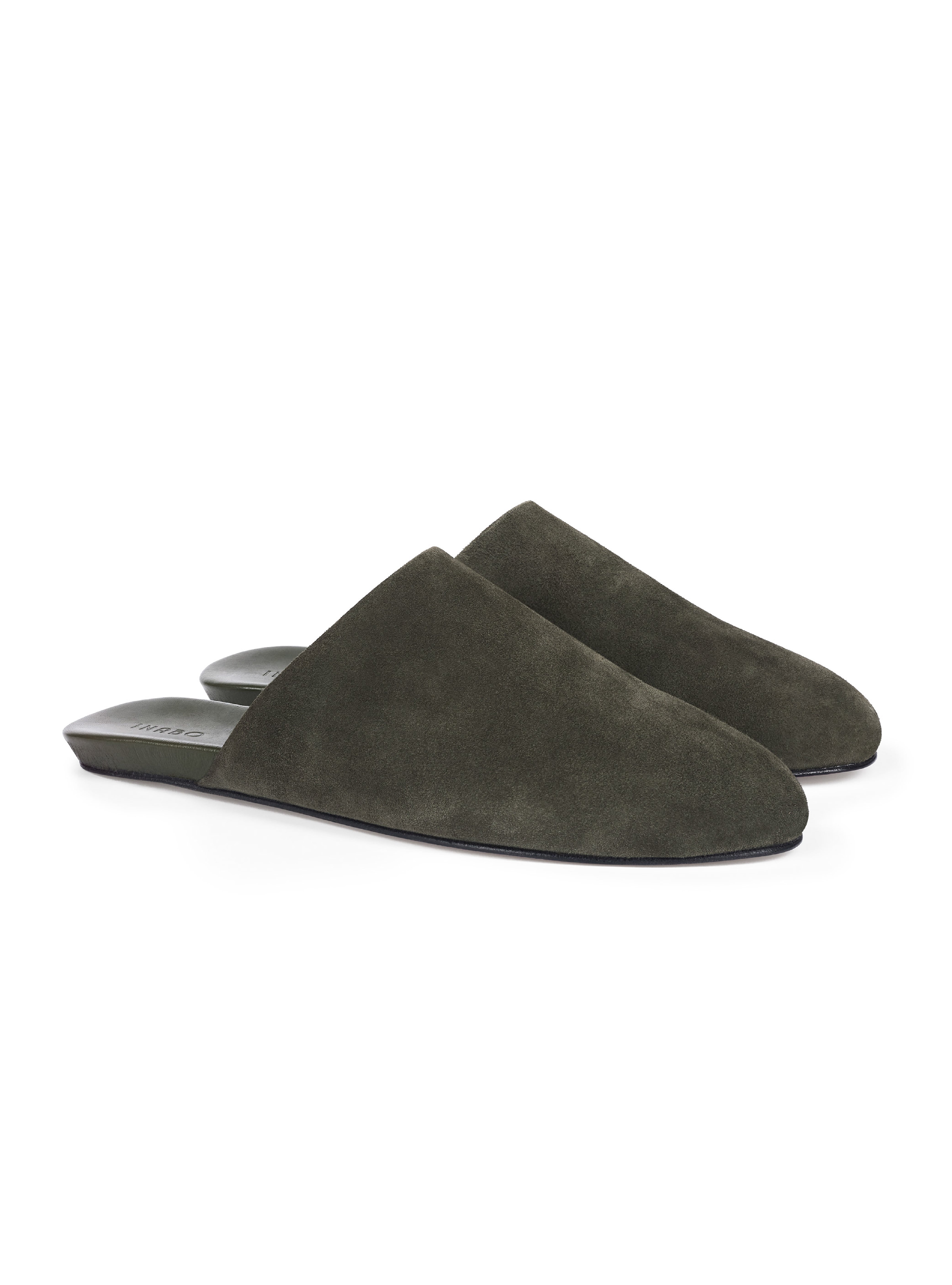 Men's pair of green suede suede slippers on a white background